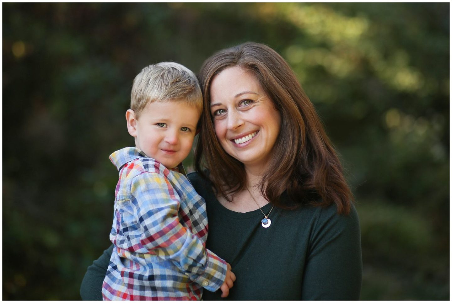 mother and son smile for Helena Woods Photography in DC