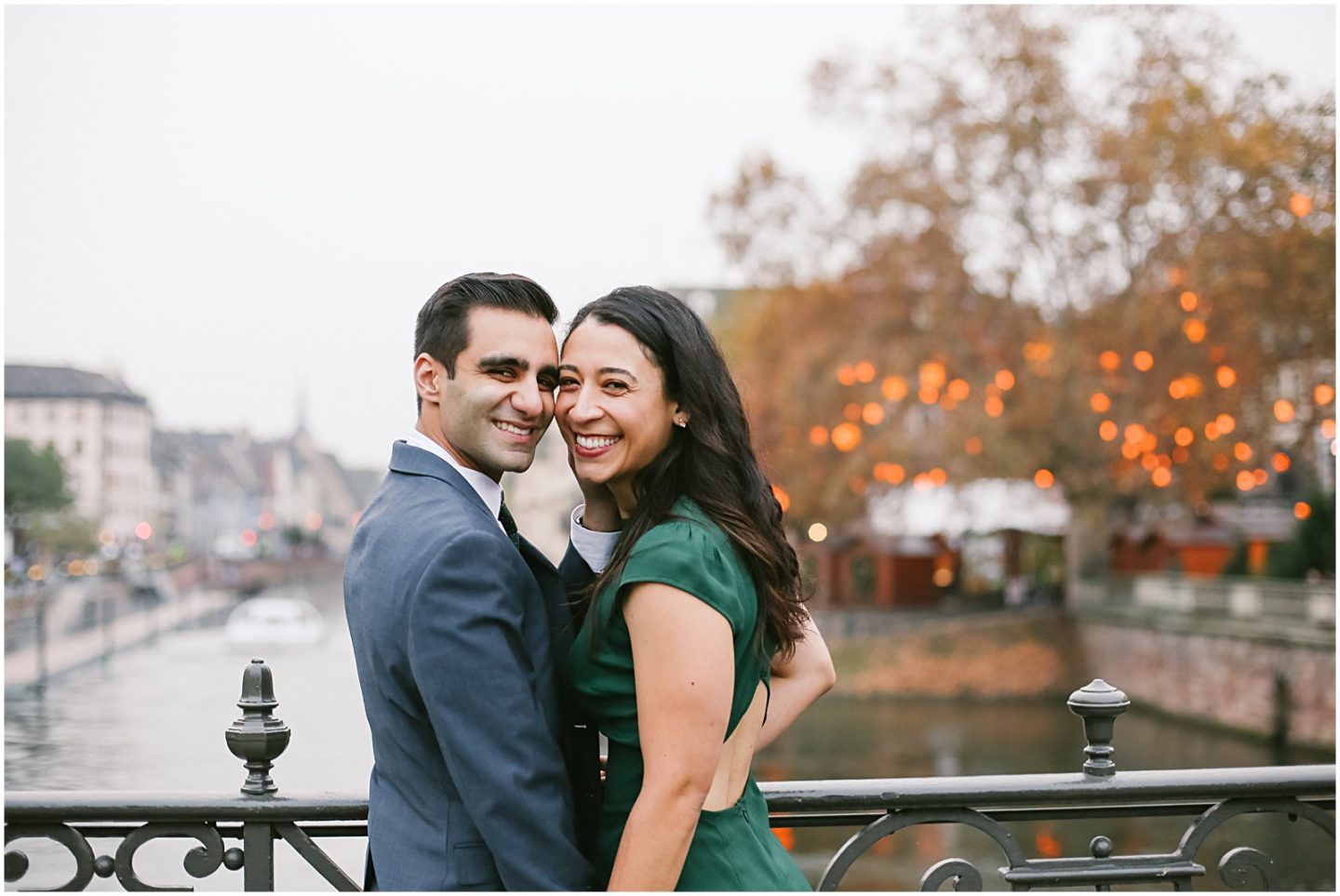 couple at engagement photo session in strasbourg france christmas markets