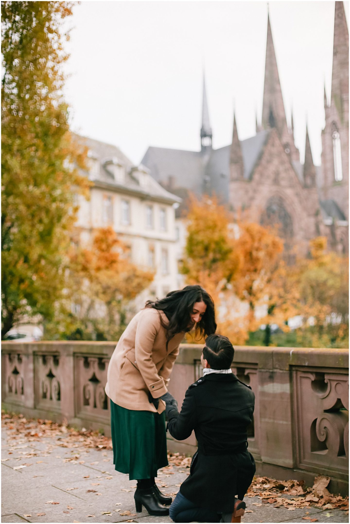 surprise engagement photos at Saint Paul's Church in Strasbourg France
