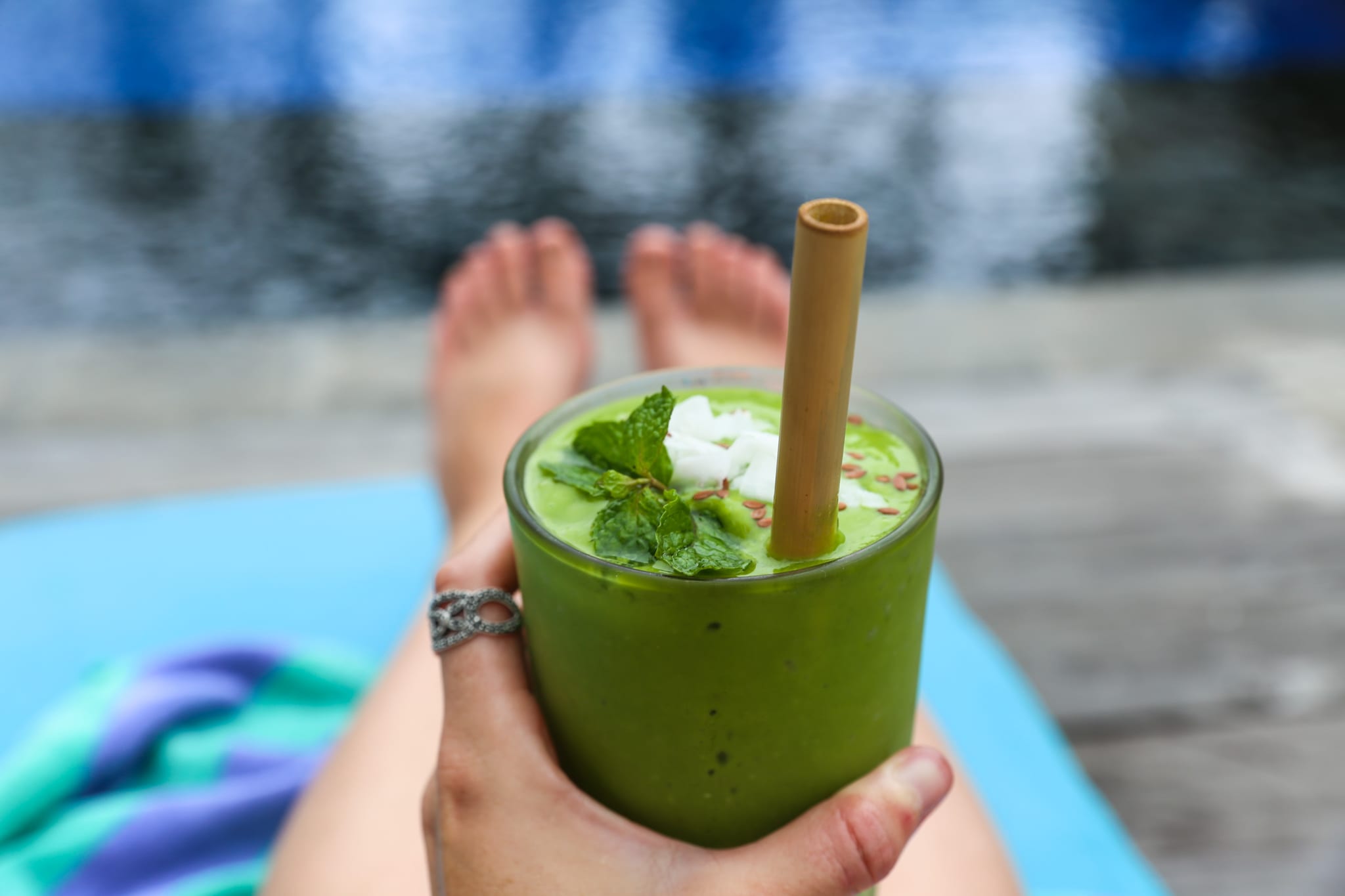 Chillhouse in Canggu Bali with green smoothie at pool 