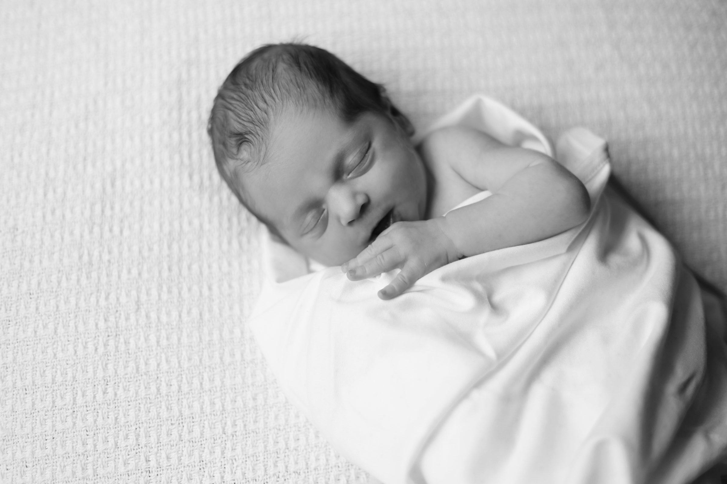 new york city newborn photographer lifestyle baby portrait session black and white classic photoshoot