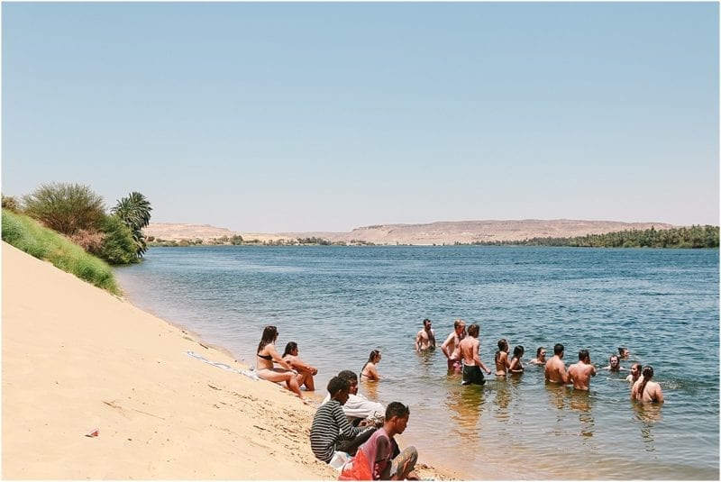 at the beach along the nile river with travel talk tour 