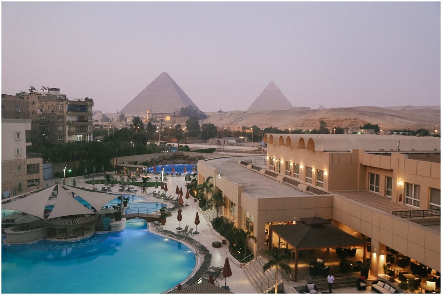 sunrise at Marriott Le Meridien Pyramids hotel pool view of Pyramids of Giza in Egypt 