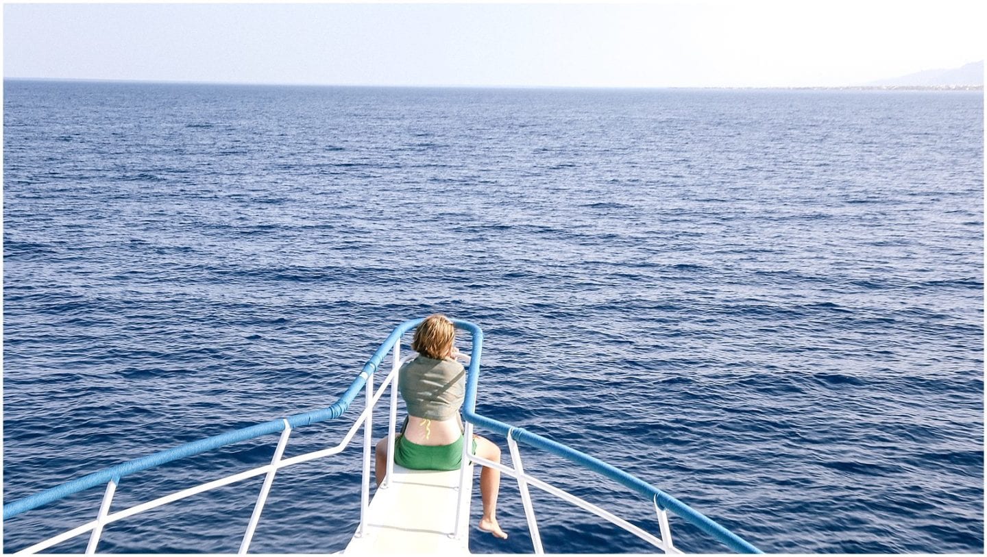 girl on a boat trip along the Red Sea Egypt Dahab