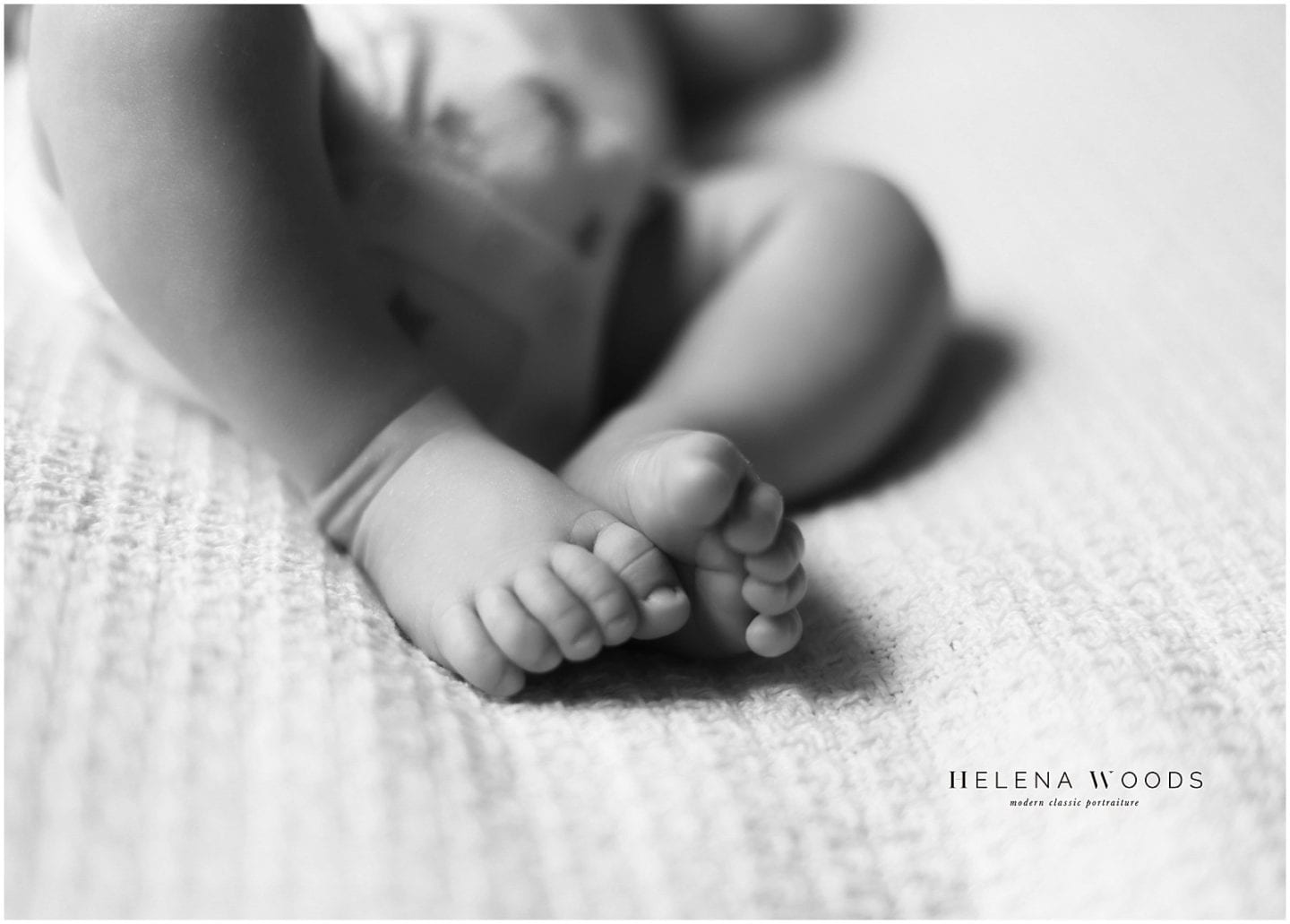baby feet as Helena Woods photographs NYC Manhattan newborn lifestyle session