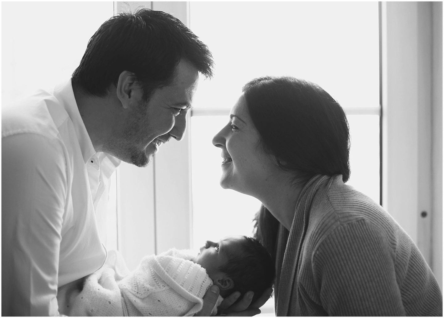Connecticut family holding newborn baby fairfield county new england photographer
