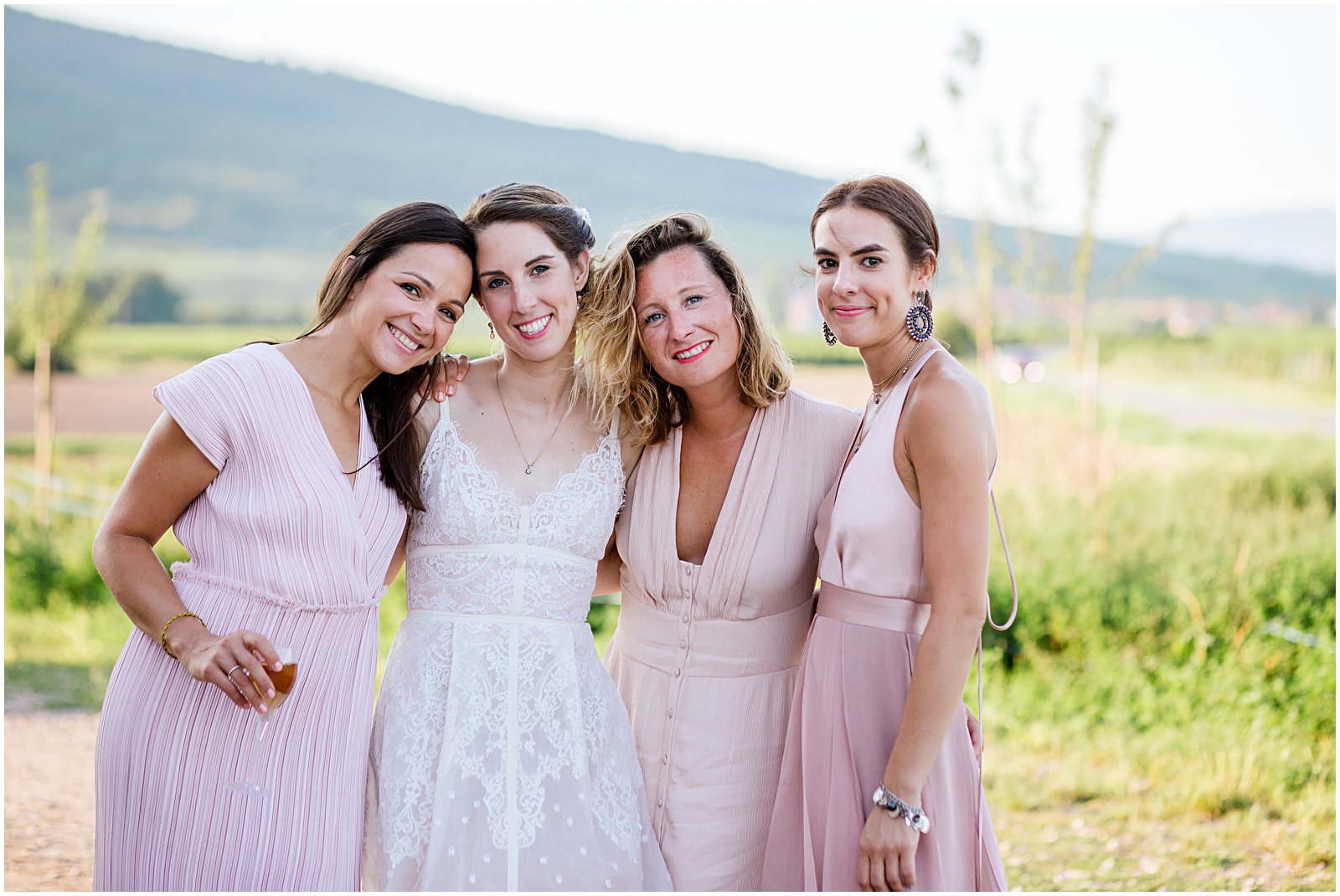bride and bridesmaids photographed at Achilles Domaine winery in Alsace France photographed by Helena Woods
