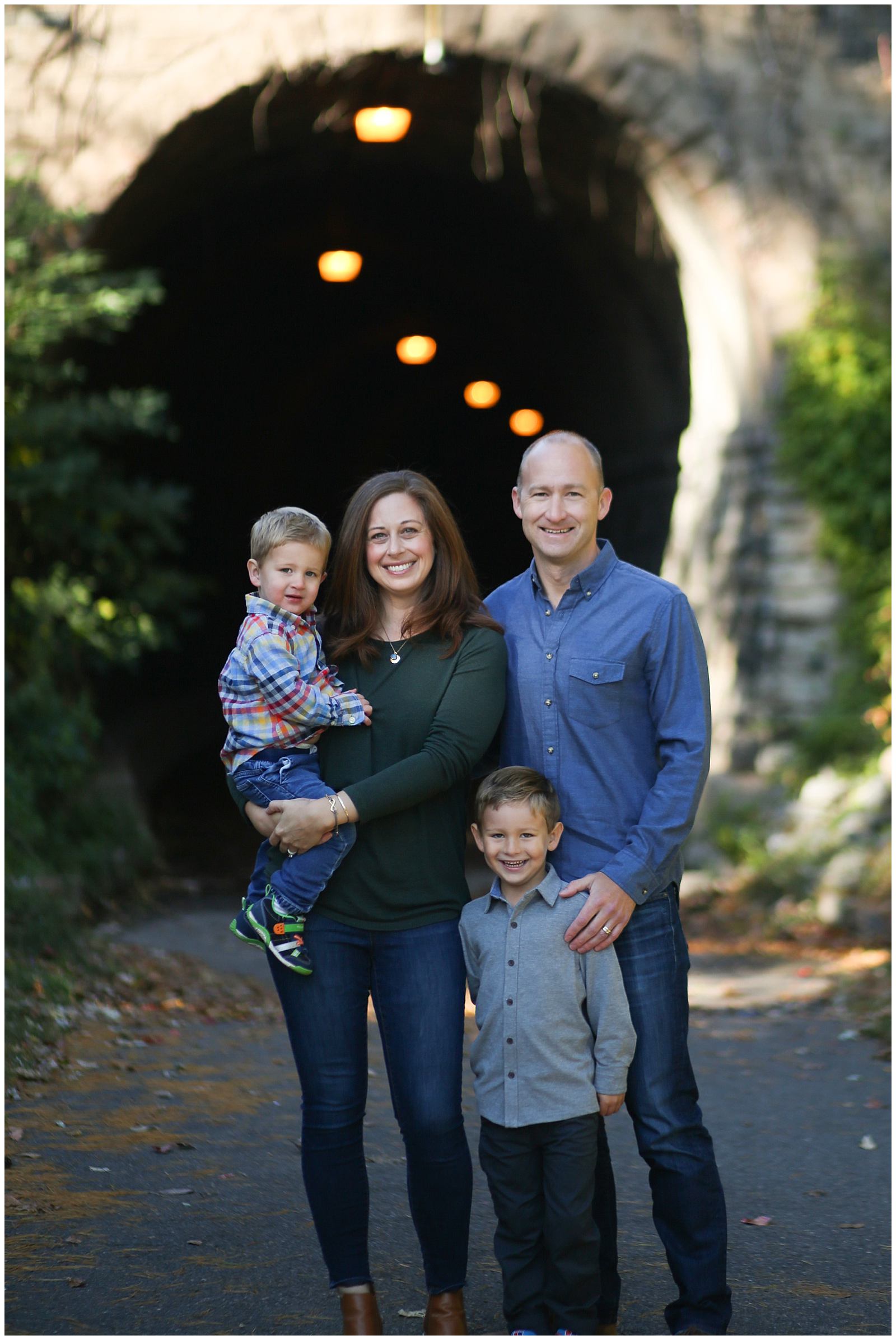 DC family photographer poses family at Wilkes Tunnel in Alexandria