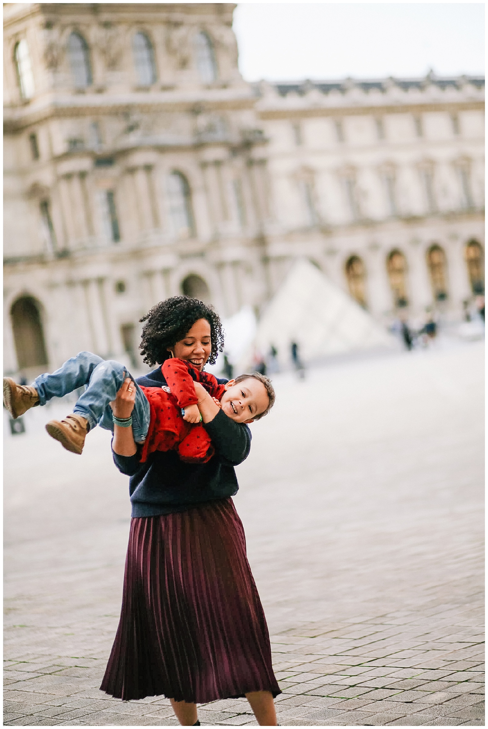 Paris family photographer photographs mother and son at Louvre