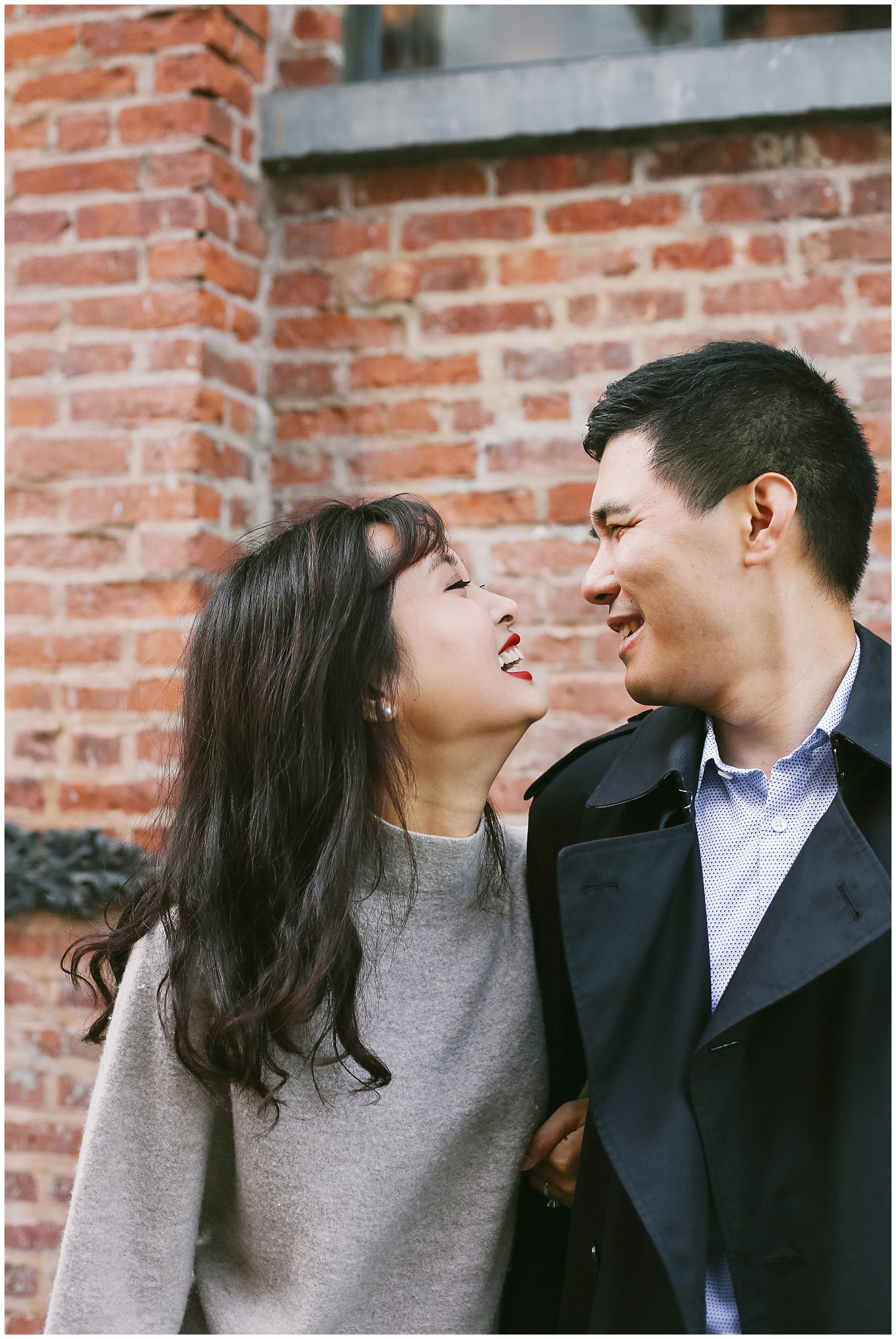NYC engagement photographer photographs couple in Brooklyn DUMBO on Water Street