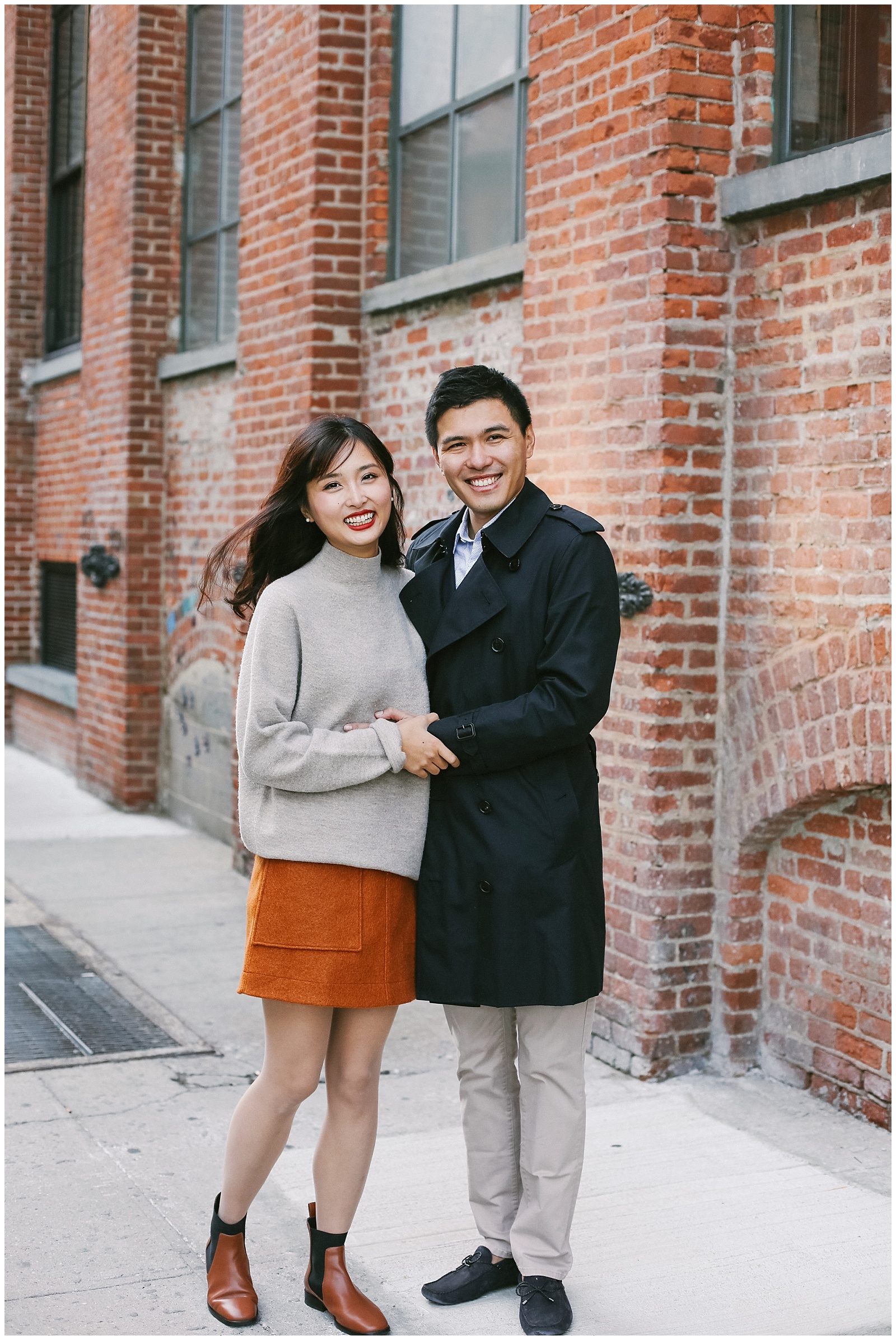 NYC engagement photographer photographs couple in Brooklyn DUMBO on Water Street