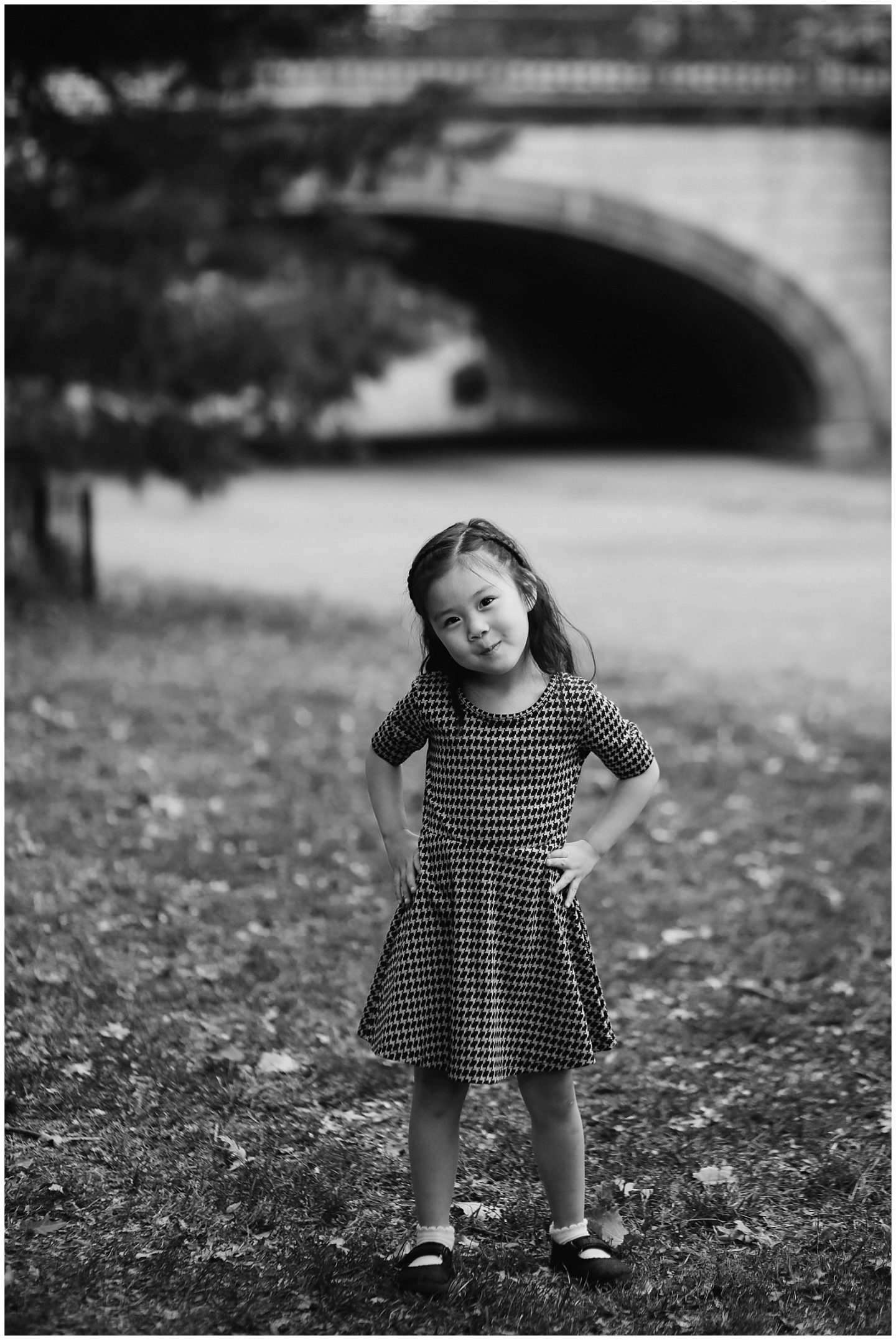 girl in dress in Central Park with nyc family photographer Helena Woods Photography