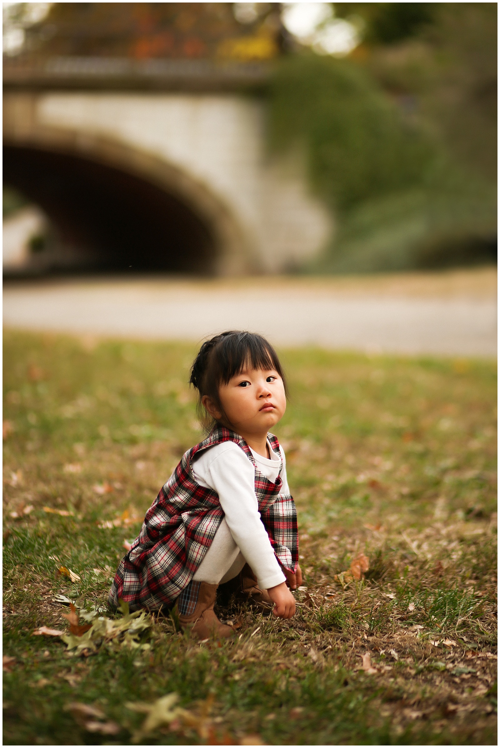 toddler pouting in Central Park for nyc family photographer helena woods