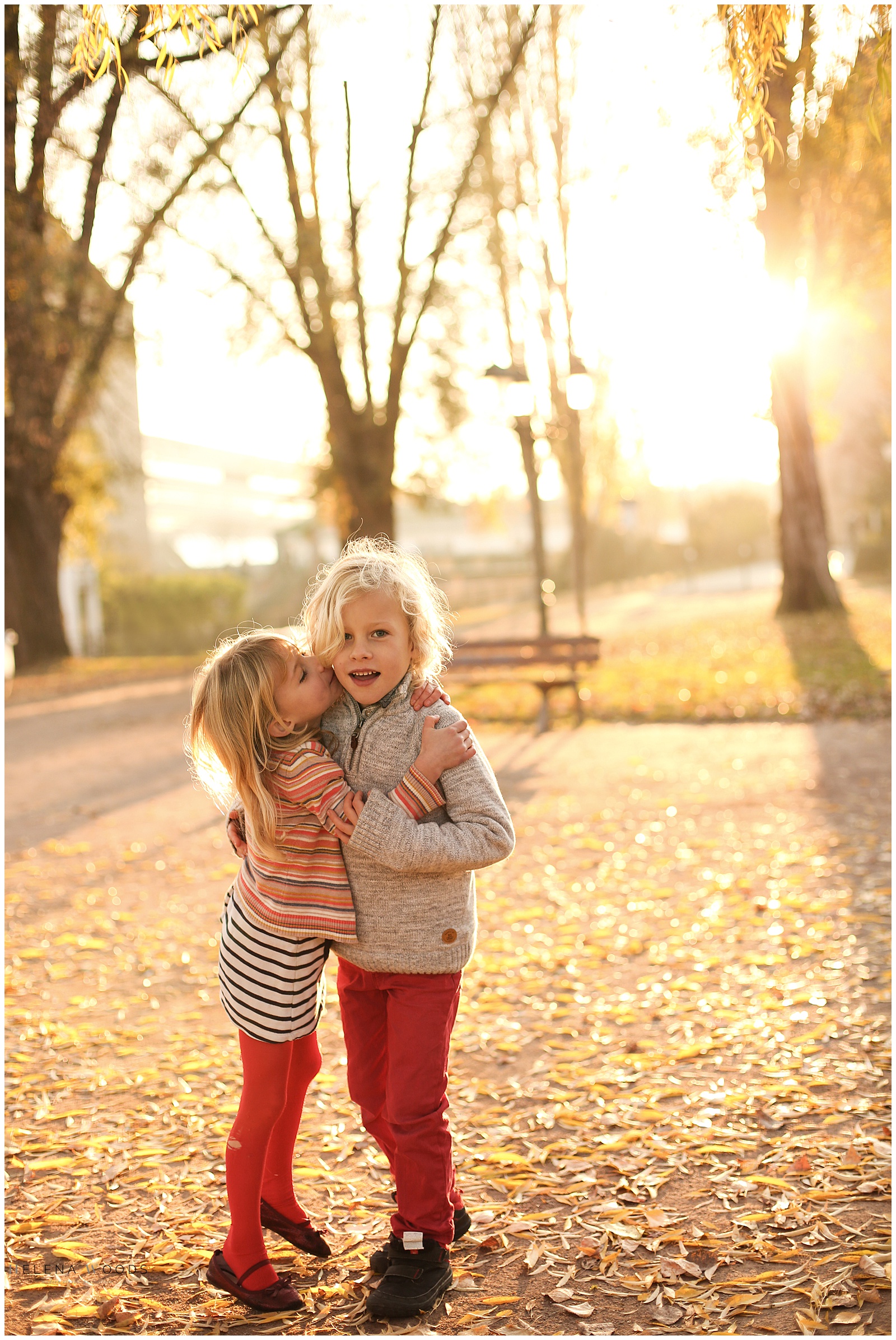 kids laughing in Strasbourg France at golden hour with family photographer Helena Woods