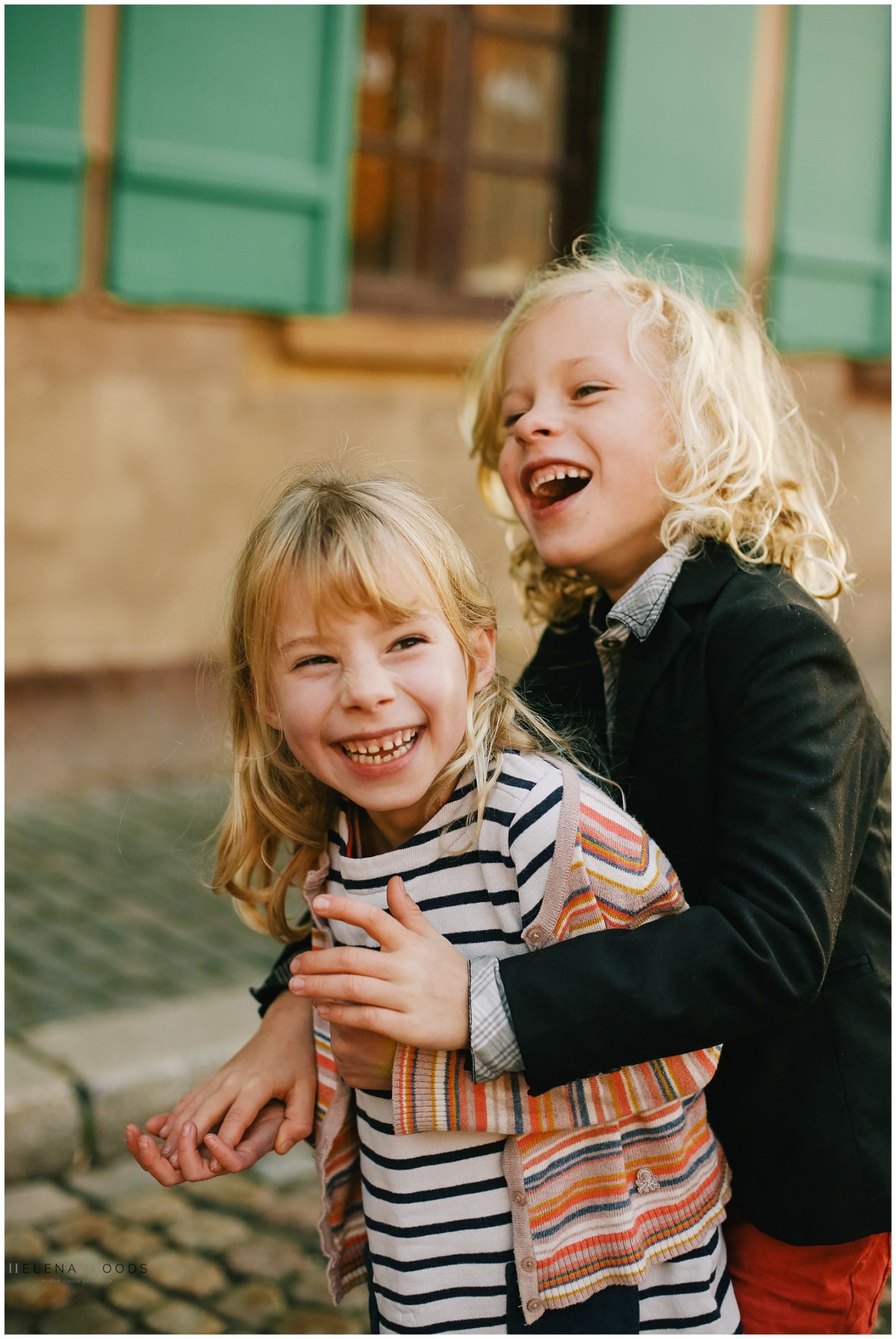 siblings laughing | family photographer Helena Woods Photography