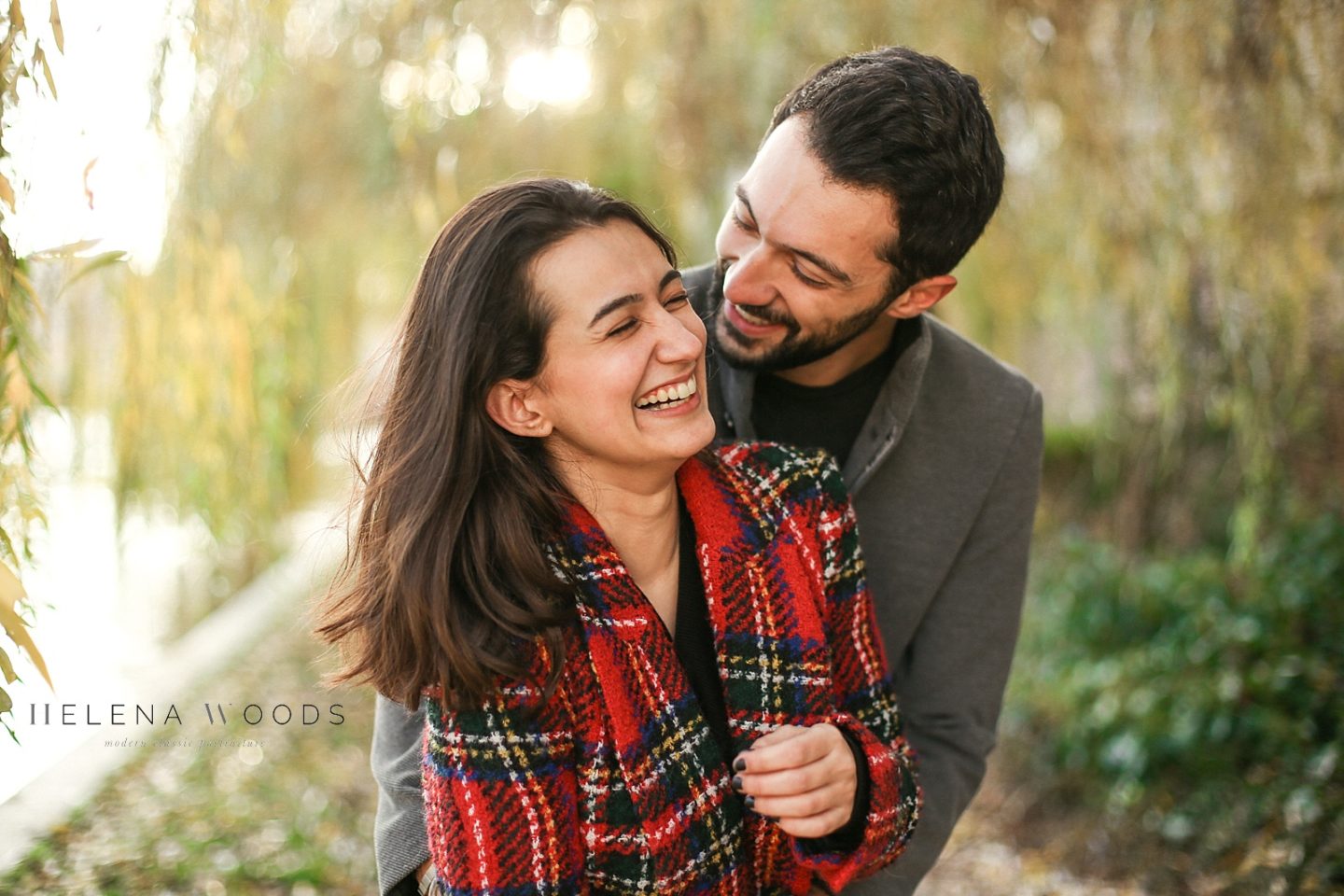 couple laughing and cuddling with Helena Woods Photography