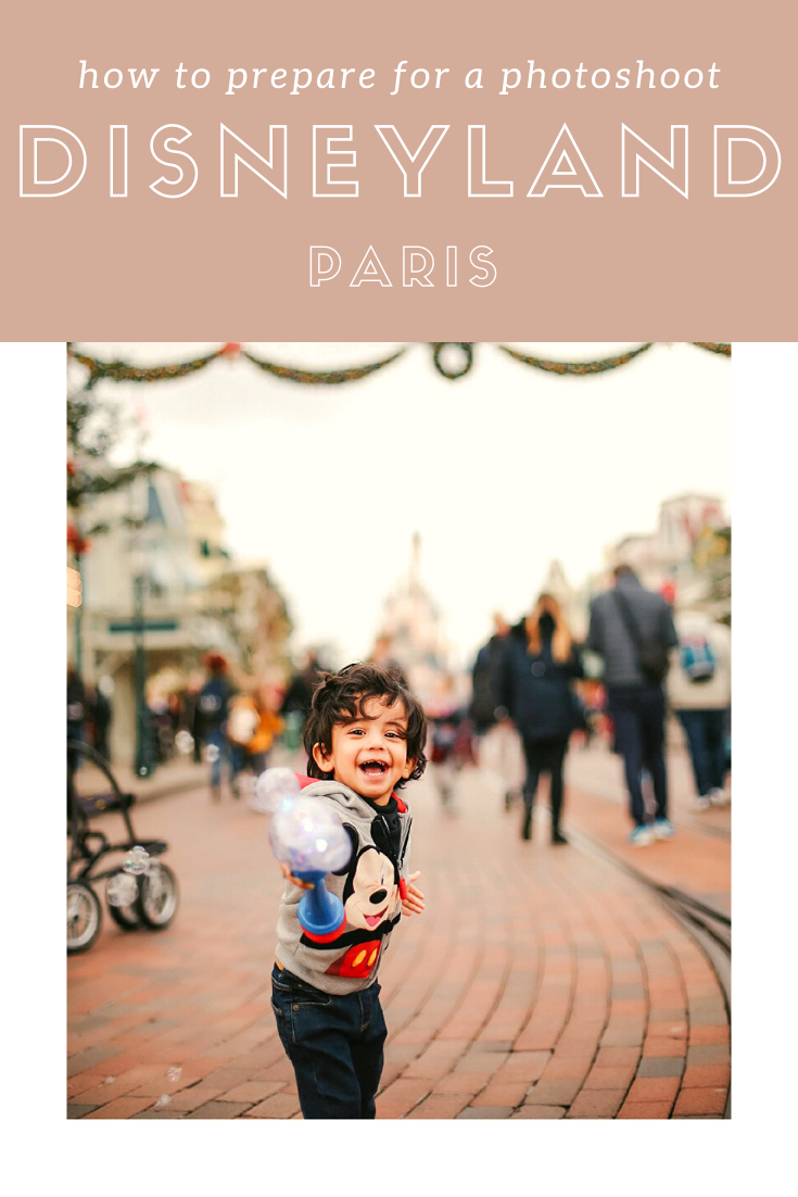 boy laughing at photoshoot at disneyland paris with family photographer helena woods